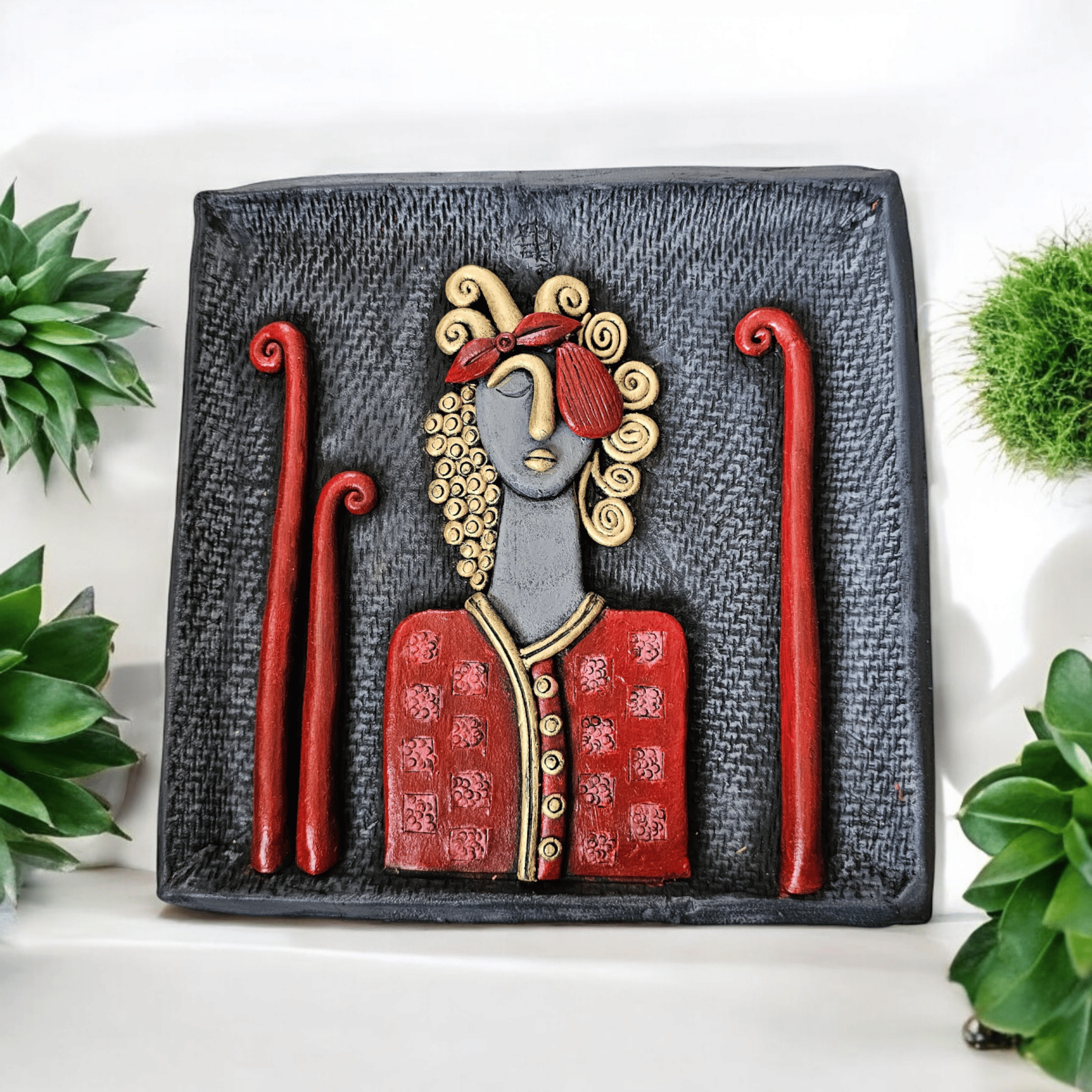 Terracotta wall doll